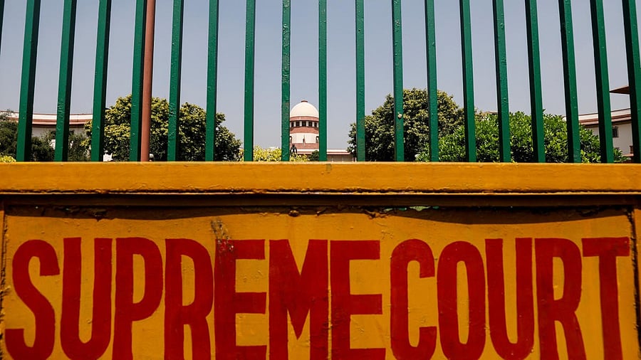 <div class="paragraphs"><p>A signboard is seen outside the premises of Supreme Court in New Delhi</p></div>