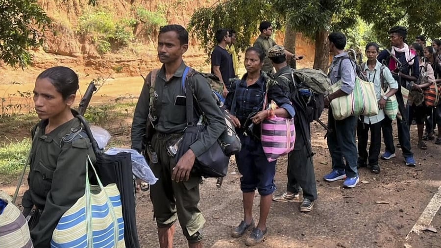 <div class="paragraphs"><p>Representative image of Maoist cadres surrender with weapons before the authorities.</p></div>