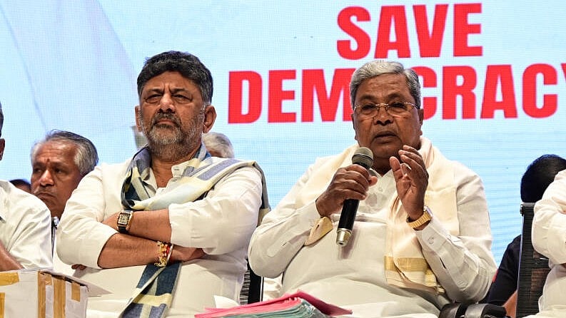 <div class="paragraphs"><p>KPCC President and deputy CM DK Shivakumar with CM Siddaramaiah</p></div>