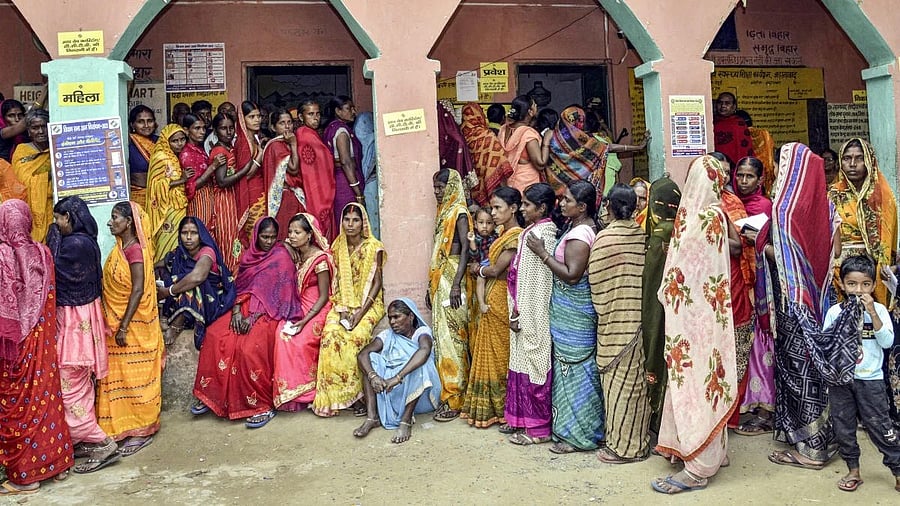 <div class="paragraphs"><p>People wait in queues to cast their votes at a polling station during the second and final phase of the Bihar Assembly elections. Representative image</p></div>