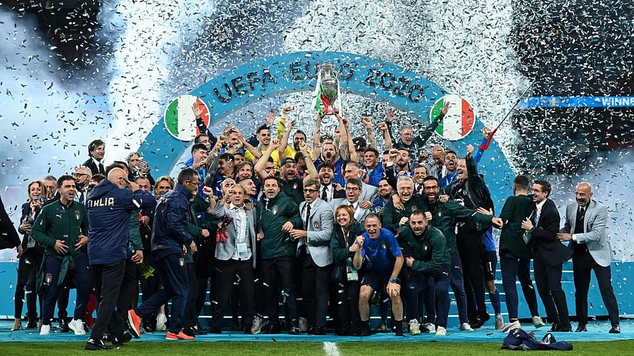 <div class="paragraphs"><p>Italy celebrate with the trophy after winning Euro 2020.</p></div>
