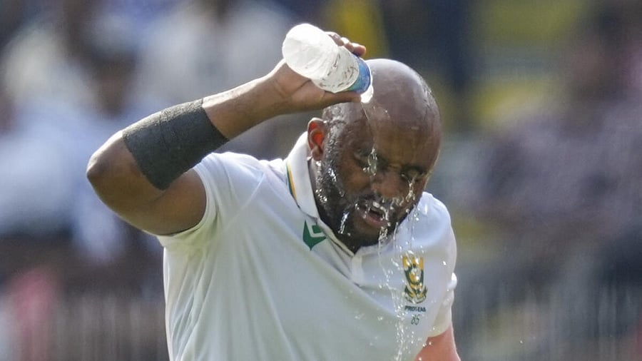 <div class="paragraphs"><p>South Africa's captain Temba Bavuma pours water on his face during the first day of the second Test cricket match between India and South Africa, at ACA Stadium, Barsapara in Guwahati, Saturday, Nov. 22, 2025.</p></div>