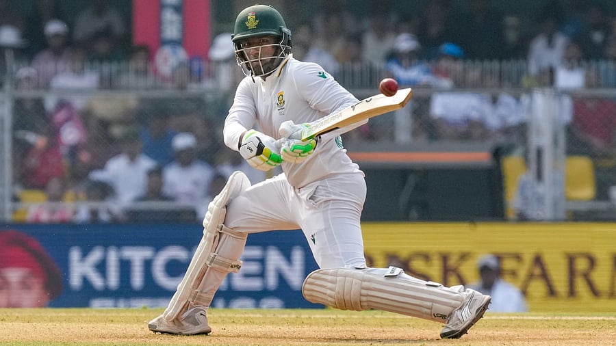 <div class="paragraphs"><p>South Africa's Senuran Muthusamy slammed a potentially match-defining century on the second day of the Guwahati Test. PTI</p></div>