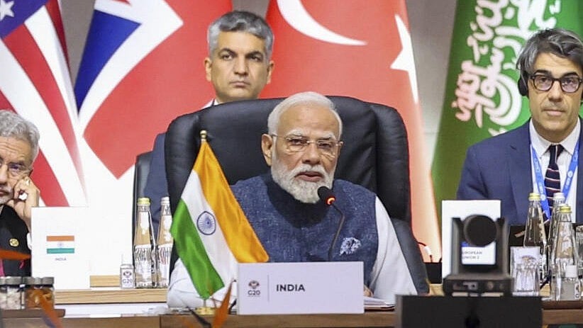 <div class="paragraphs"><p>Prime Minister Narendra Modi during the Session III 'A Fair and a Just Future for All- Critical Minerals; Decent Work; Artificial Intelligence', of the G20 Leaders' Summit in Johannesburg, South Africa. Other leaders are also present.</p></div>