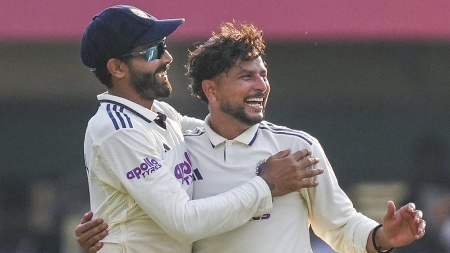 <div class="paragraphs"><p>India's Kuldeep Yadav (R) celebrates with teammate Ravindra Jadeja after taking the wicket of South Africa's Wiaan Mulder during the first day of the second Test cricket match between India and South Africa, at ACA Stadium, Barsapara in Guwahati.</p></div>
