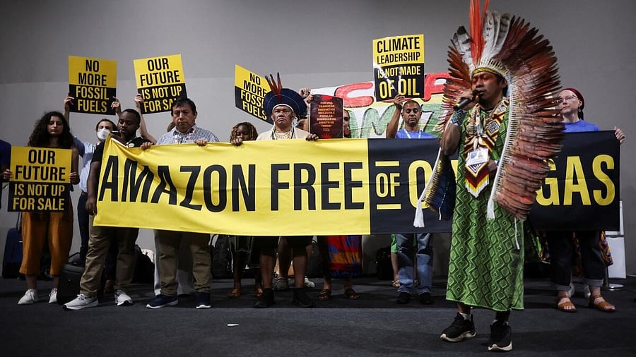 <div class="paragraphs"><p>Activists and Indigenous people take part in a Stop EACOP campaign protest against fossil fuels during the UN Climate Change Conference (COP30) in Belem</p><p></p></div>