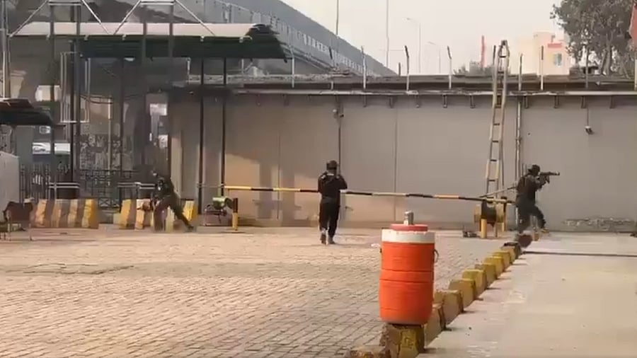 <div class="paragraphs"><p>Screengrab of gunfire in the Pakistan paramilitary force headquarters.</p></div>