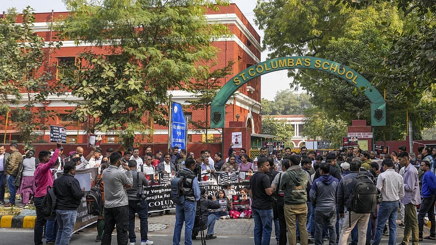 <div class="paragraphs"><p>People participate in a protest by school students and parents of a Class 10 student, who allegedly died by suicide due to mental harassment, demanding strict action against those responsible, outside St Columba's School, in New Delhi.</p></div>