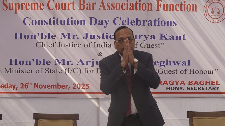 <div class="paragraphs"><p>CJI Surya Kant gestures during Constitution Day celebrations at Supreme Court premises.</p></div>