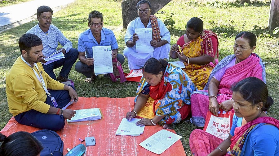 <div class="paragraphs"><p>A Booth Level Officer (BLO) oversees the filling of enumeration forms by voters for the special intensive revision (SIR) of electoral rolls, in  West Bengal.</p></div>