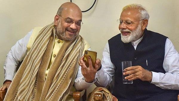 <div class="paragraphs"><p>Prime Minister Narendra Modi and Union Home Minister Amit Shah (L).</p></div>