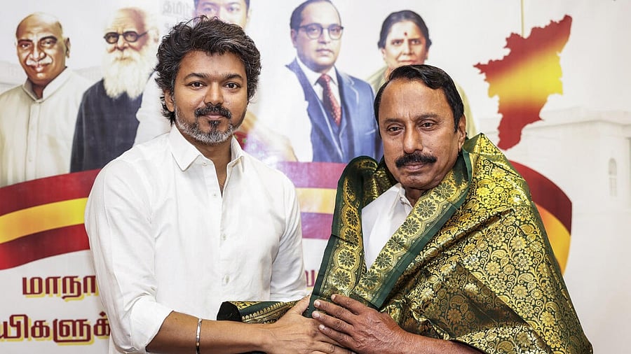 <div class="paragraphs"><p>Tamilaga Vettri Kazhagam (TVK) leader Vijay with former MLA K.A. Sengottaiyan, as the latter joins the party, at the Panaiyur headquarters office.</p></div>