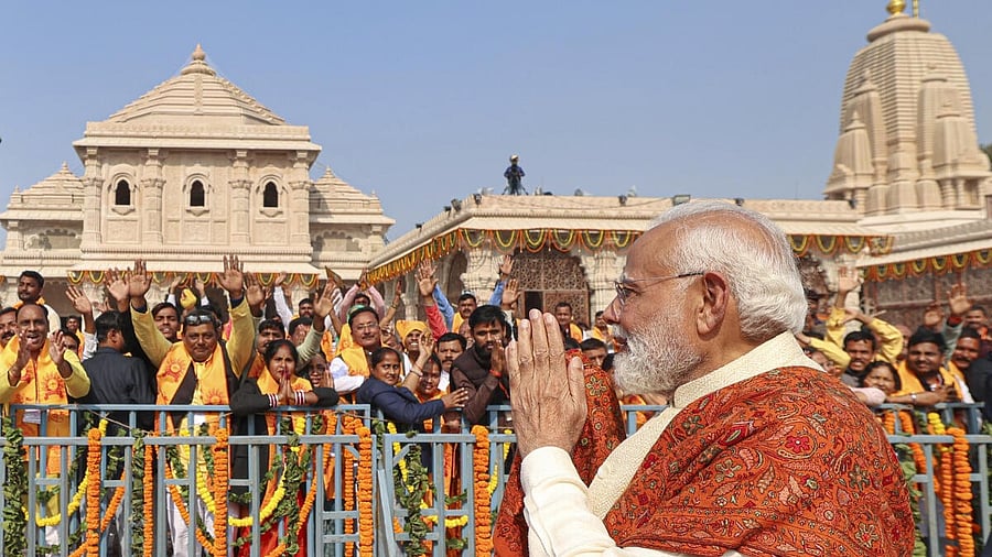 <div class="paragraphs"><p>Prime Minister Narendra Modi greets the gathering during the ‘Dhwajarohan’ ceremony at the Ram Temple, in Ayodhya, Uttar Pradesh</p></div>