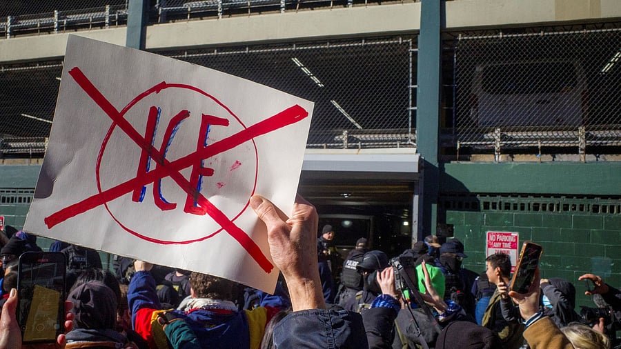 <div class="paragraphs"><p>People gather to prevent ICE officers from leaving for an immigration raid, in New York City.</p></div>
