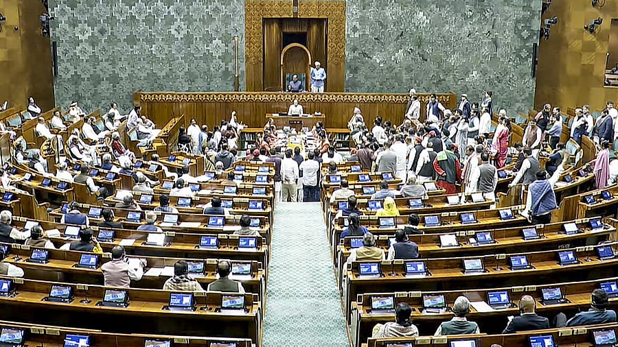 <div class="paragraphs"><p>Lok Sabha Speaker Om Birla conducts proceedings in the House amid protest by opposition members in the well on the first day of the Winter Session of Parliament, in New Delhi.</p></div>