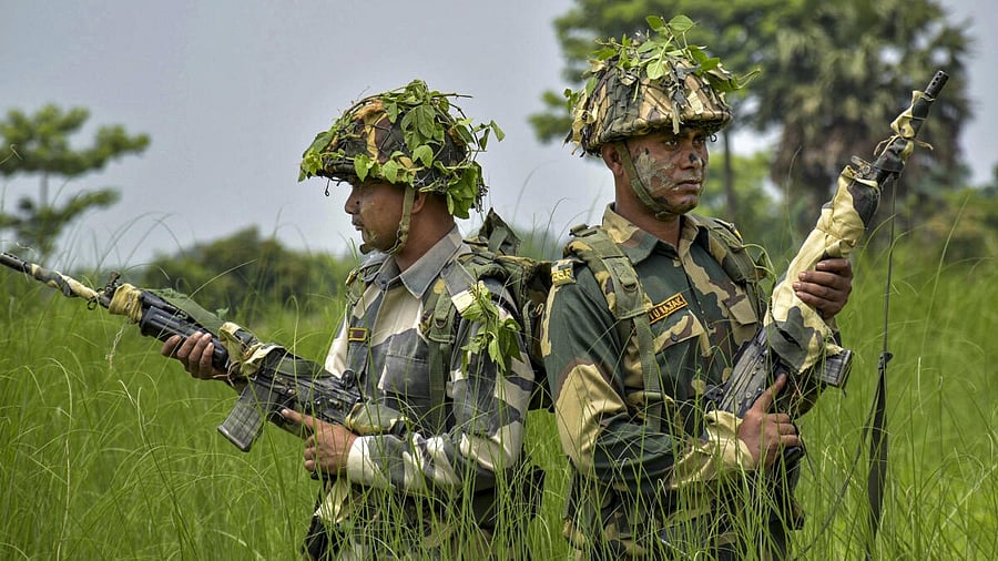 <div class="paragraphs"><p>Border Security Force (BSF) personnel keep vigil at the India-Bangladesh border, in West Bengal.</p></div>
