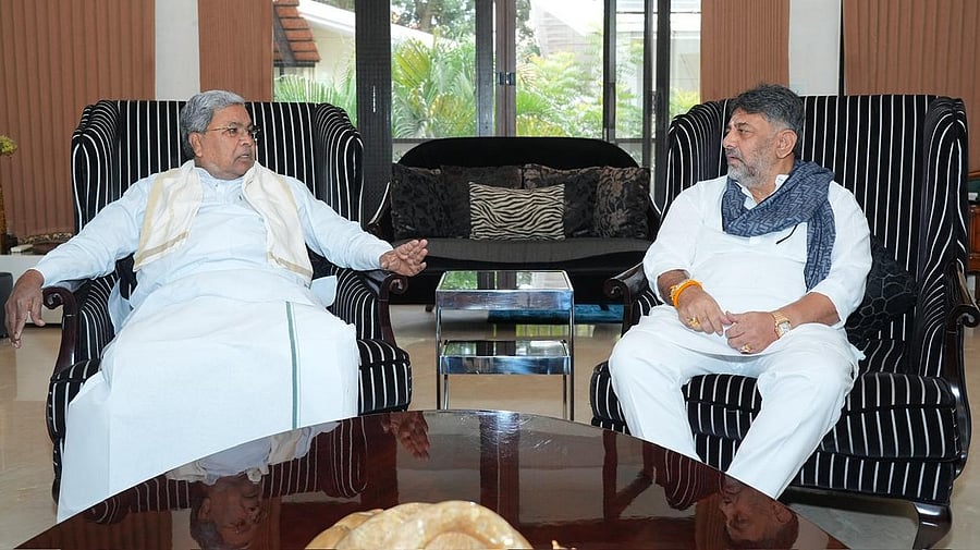 <div class="paragraphs"><p>Chief Minister Siddaramaiah with Deputy Chief Minister D K Shivakumar at the latter's residence in Bengaluru on Tuesday.&nbsp;&nbsp;</p></div>