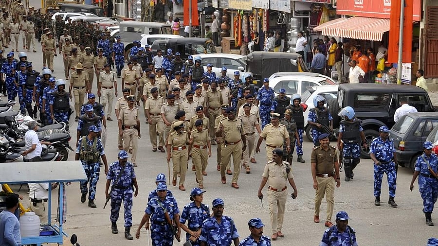 <div class="paragraphs"><p>Police personnel carry out route march a head of Datta Jayanthi in Chikkamgaluru</p></div>