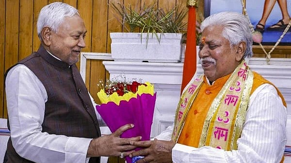 <div class="paragraphs"><p>Bihar Chief Minister Nitish Kumar (L) greets newly elected Assembly Speaker Prem Kumar on the second day of Winter session of the State Assembly, in Patna.</p></div>