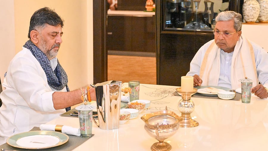 <div class="paragraphs"><p>Deputy CM DK Shivakumar (L) and CM Siddaramaiah (R) at the former's residence.</p></div>