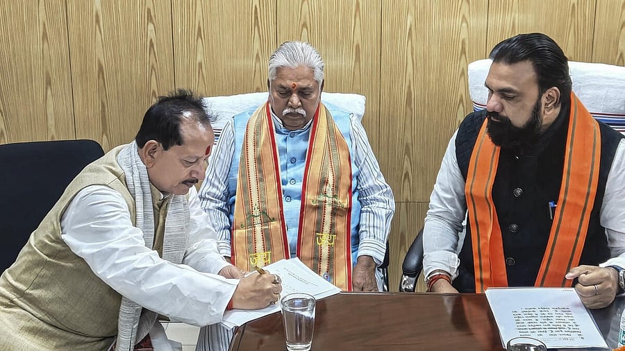 <div class="paragraphs"><p>BJP MLA Prem Kumar in the presence of Bihar Deputy CMs Vijay Sinha and Samrat Choudhary files his nomination for the Speaker’s post, in Patna, Monday.</p></div>