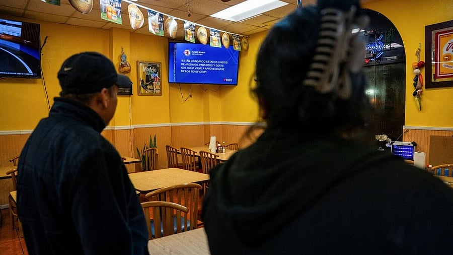 <div class="paragraphs"><p>Family members, who say they are looking to protect themselves from potentially being profiled by federal agents while travelling between home and work, watch the news displaying an X post from Secretary of Homeland Security Kristi Noem about immigration while staying at their restaurant, amid reports that the US Department of Homeland Security is planning to deploy federal border agents to Louisiana in the coming days, in New Orleans, Louisiana, U.S., December 2, 2025.</p></div>
