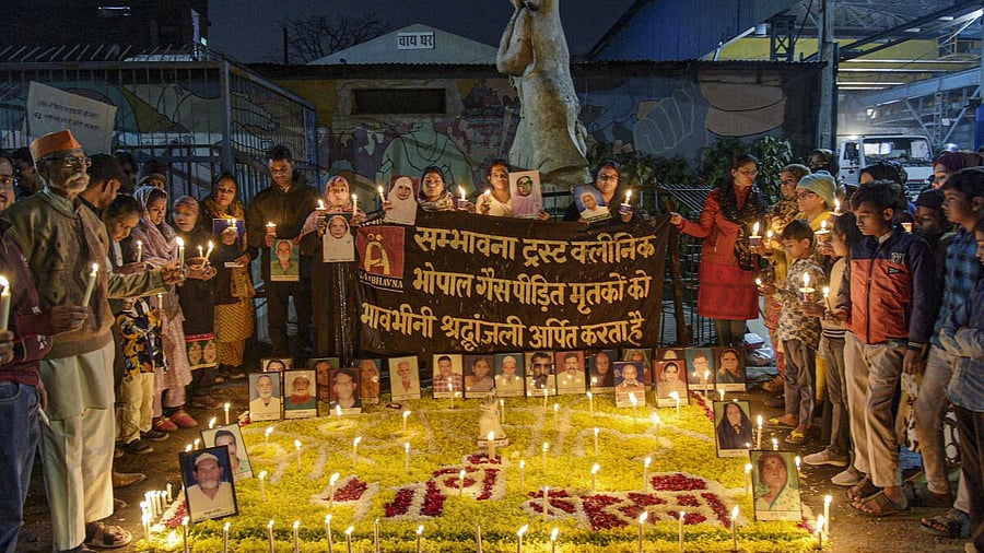 <div class="paragraphs"><p>People hold a candlelight vigil to pay homage to the victims of the Bhopal gas tragedy on its 41st anniversary.</p></div>