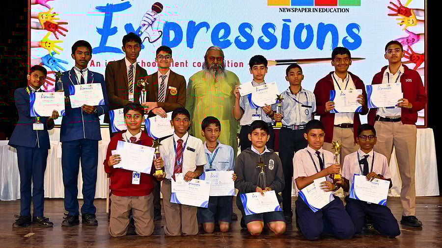 Winners of senior and junior division quiz competition in DHiE Expressions in Bengaluru on Wednesday.