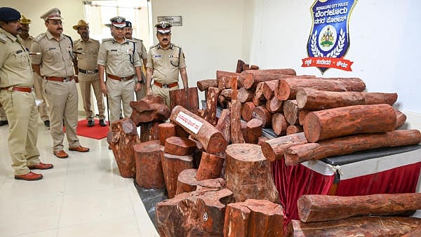 <div class="paragraphs"><p>Bengaluru police with red sandalwood. Image for representational purpose.</p></div>