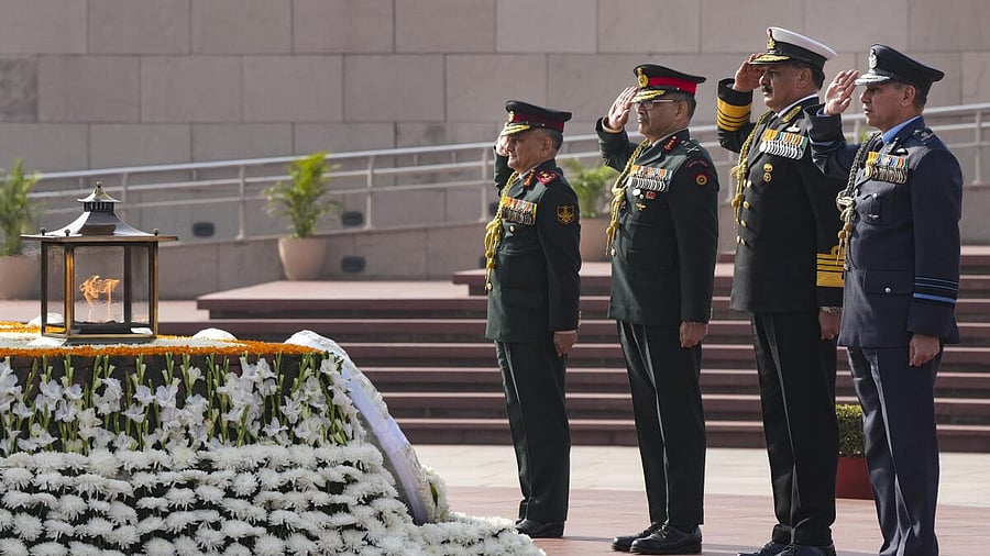 <div class="paragraphs"><p>Chief of Defence Staff General Anil Chauhan, Vice Chief of Army Staff Lt Gen Pushpendra Singh, Vice Chief of the Air Staff Air Marshal Narmdeshwar Tiwari, Chief of Defence Staff General Anil Chauhan and Chief of Naval Staff Admiral Dinesh K Tripathi during Navy Day observance at National War Memorial, in New Delhi.</p></div>