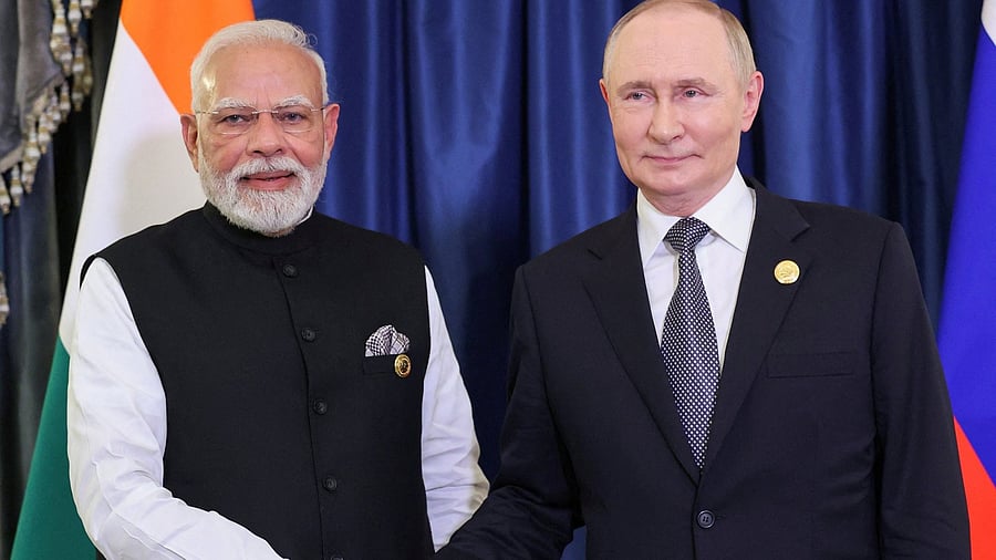 <div class="paragraphs"><p>Russian President Vladimir Putin shakes hands with Indian Prime Minister Narendra Modi before their meeting on the sidelines of the Shanghai Cooperation Organisation (SCO) summit in Tianjin, China, September 1, 2025. </p></div>