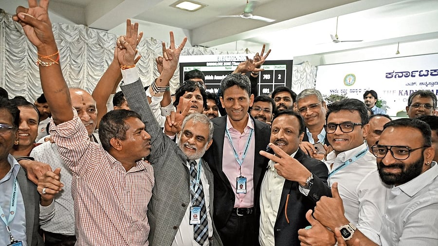 Former cricketer Venkatesh Prasad's team celebrates after winning the Karnataka State Cricket Association (KSCA) elections at M Chinnaswamy stadium on Sunday. DH PHOTO/PUSHKAR V