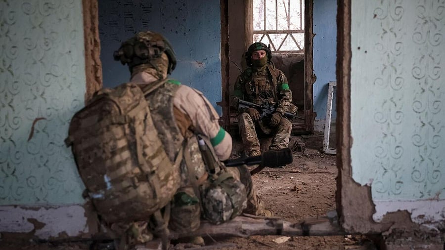 <div class="paragraphs"><p>Servicemen of the 49th Separate Assault Battalion Carpathian Sich of the Armed Forces of Ukraine hide from a Russian combat drone in a building damaged by Russian military strike, amid Russia's attack on Ukraine, in the frontline town of Kostiantynivka in Donetsk region, Ukraine December 7, 2025.</p></div>