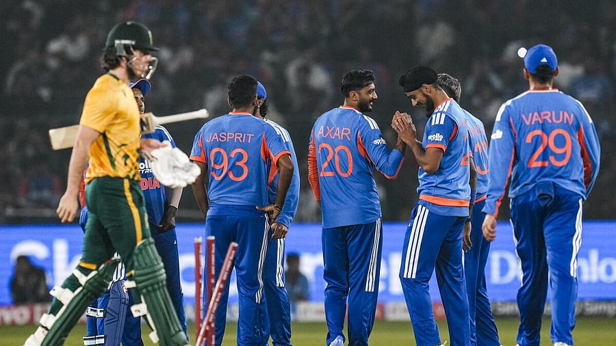 <div class="paragraphs"><p>India's players celebrate the wicket of South Africa's Dewald Brevis, left, during the first T20I cricket match between India and South Africa at Barabati Stadium, in Cuttack, Tuesday, Dec. 9, 2025.Credit: PTI</p></div>