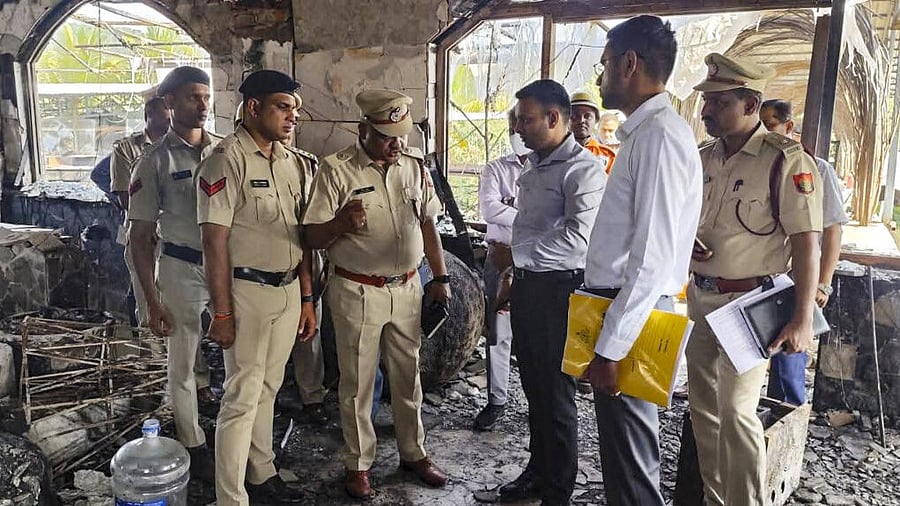 <div class="paragraphs"><p>Police and forensic personnel inspect the site where a fire killed 25 people at the Birch by Romeo Lane nightclub, in Arpora, Goa.</p></div>
