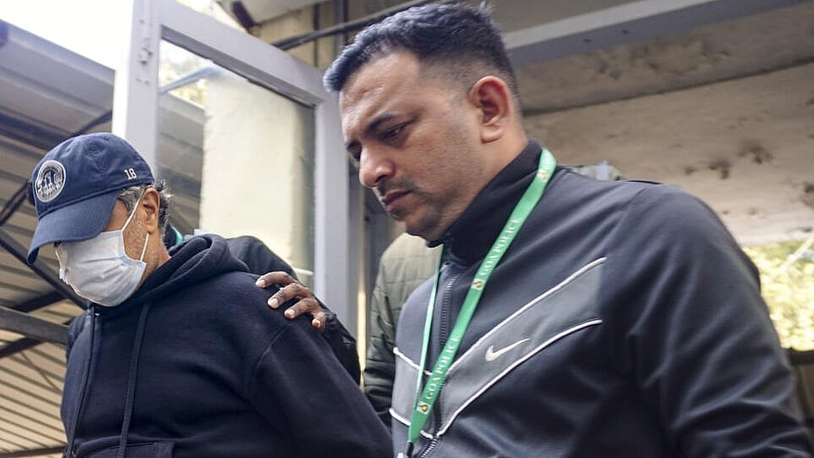 <div class="paragraphs"><p>Goa Police bring Ajay Gupta, one of the four owners of the 'Birch by Romeo Lane' nightclub, to the Sunlight Colony Crime Branch office in connection with the North Goa fire tragedy that kills 25 people, in New Delhi.</p></div>