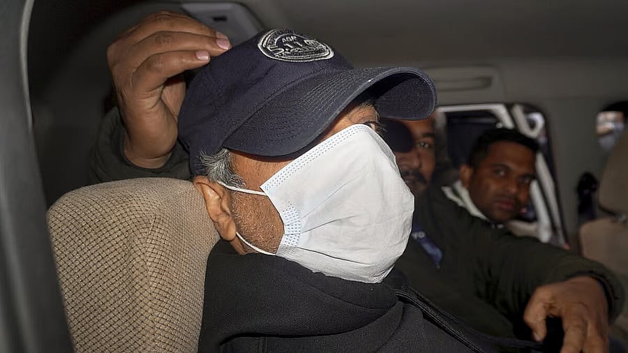 <div class="paragraphs"><p>Goa Police bring Ajay Gupta, one of the four owners of the 'Birch by Romeo Lane' nightclub, to the Sunlight Colony Crime Branch office in connection with the North Goa fire tragedy that killed 25 people.</p></div>