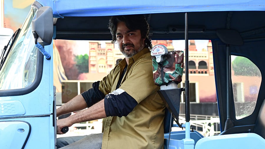 Rakesh B Pal,37, started driving an auto rickshaw about 20 days ago. DH Photo/B K Janardhan