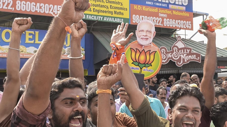 <div class="paragraphs"><p>BJP members celebrate during the counting of votes for the Kerala local body elections, in Thiruvananthapuram, Saturday, Dec. 13, 2025.</p></div>