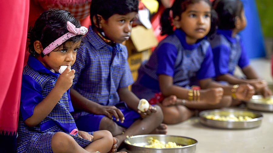 <div class="paragraphs"><p>File photo of Children eating their mid-day meal. Image for representational purpose.</p></div>