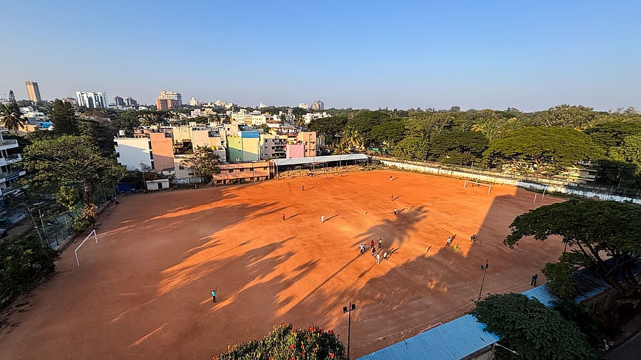 <div class="paragraphs"><p>Nandan Ground in Austin Town. A poster outside the century-old BBMP ground in early December announced plans to develop it into a football stadium with an artificial turf. </p></div>