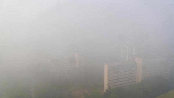<div class="paragraphs"><p>Aerial view of high-rise buildings barely visible through dense fog on a cold winter morning, in New Delhi.</p></div>
