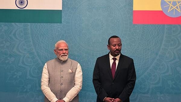 <div class="paragraphs"><p>Prime Minister Narendra Modi and Ethiopia's Prime Minister Abiy Ahmed attend the signing ceremony of Memorandum of Understanding on strengthening bilateral cooperation at the National Palace, in Addis Ababa, Ethiopia.</p></div>