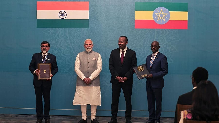 <div class="paragraphs"><p>Prime Minister Narendra Modi and Ethiopia's Prime Minister Abiy Ahmed attend the signing ceremony of Memorandum of Understanding on strengthening bilateral cooperation at the National Palace, in Addis Ababa, Ethiopia.</p></div>