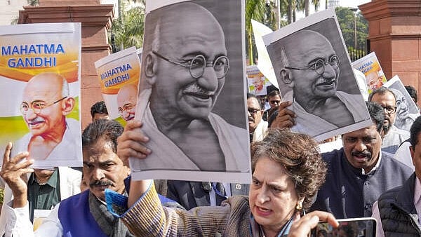 <div class="paragraphs"><p>Congress MPs Priyanka Gandhi Vadra and K.C. Venugopal along with other opposition MPs participate in a protest march against the VB-G RAM G Bill</p></div>