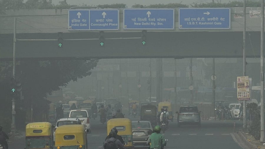 <div class="paragraphs"><p> Vehicles move amid smog at Vikas Marg.</p></div>