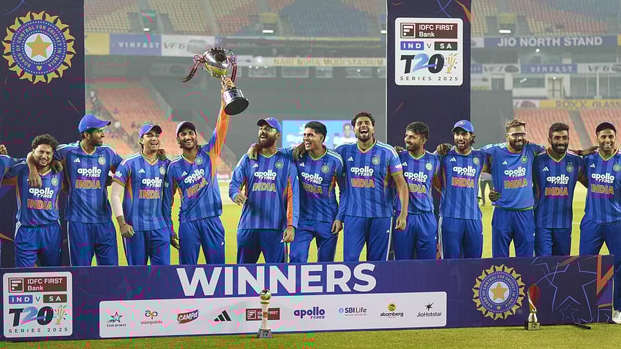 <div class="paragraphs"><p>Indian players pose with the trophy following their victory in the T20 International cricket series against South Africa, at Narendra Modi Stadium in Ahmedabad.</p></div>