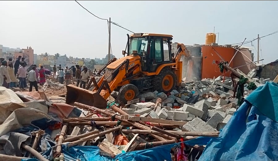 Officials of the Greater Bengaluru Authority demolish more than 300 allegedly illegal houses in Fakir Colony and Waseem Layout on Saturday.