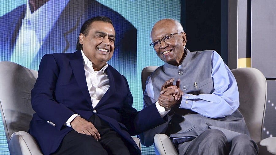 <div class="paragraphs"><p>Reliance Industries Chairman Mukesh Ambani, left, with scientist Dr. R. A. Mashelkar during the launch of the latter's book 'More from Less for More', in Mumbai, Saturday, Dec. 20, 2025.</p></div>