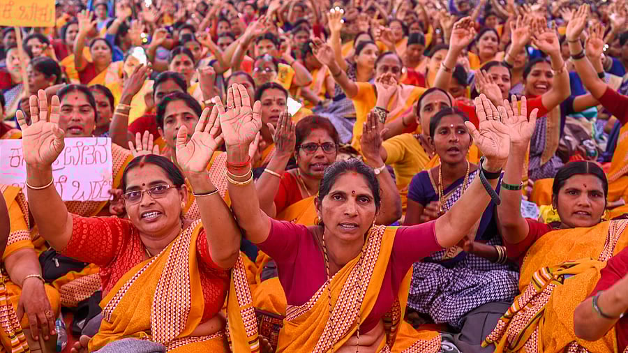 A file photo of a protest by anganwadi workers and helpers in Bengaluru. Forming the basic units of infant and maternal care, anganwadi centres have remained perennially sick. Many operate out of rented buildings and have no separate kitchens or playgrounds.